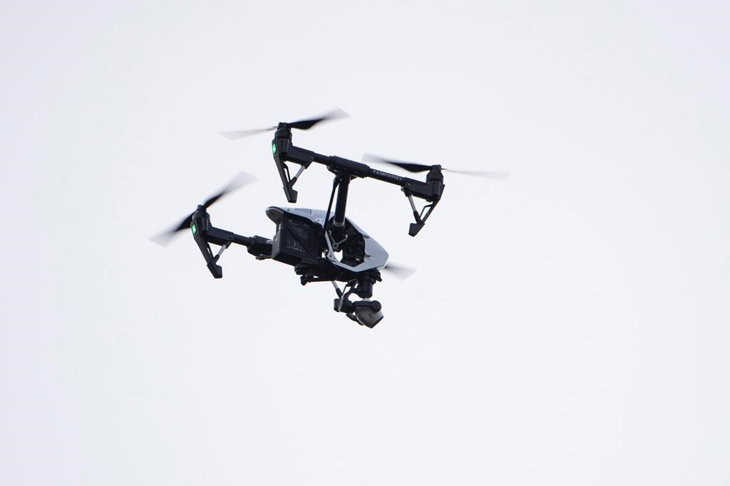 A drone is flown in a residential neighborhood in Upper Moreland, Pa., Thursday, Aug. 8, 2019. 