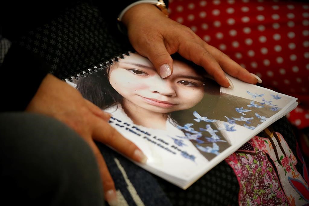 Sagkeeng Coun. Marilyn Courchene holds a report by Daphne Penrose, the Manitoba advocate for children and youth, focusing on the death of 15-year-old Tina Fontaine at a release event at the Sagkeeng Mino Pimatiziwin Family Treatment Centre on the Sagkeeng First Nation, Man., Tuesday, March 12, 2019.