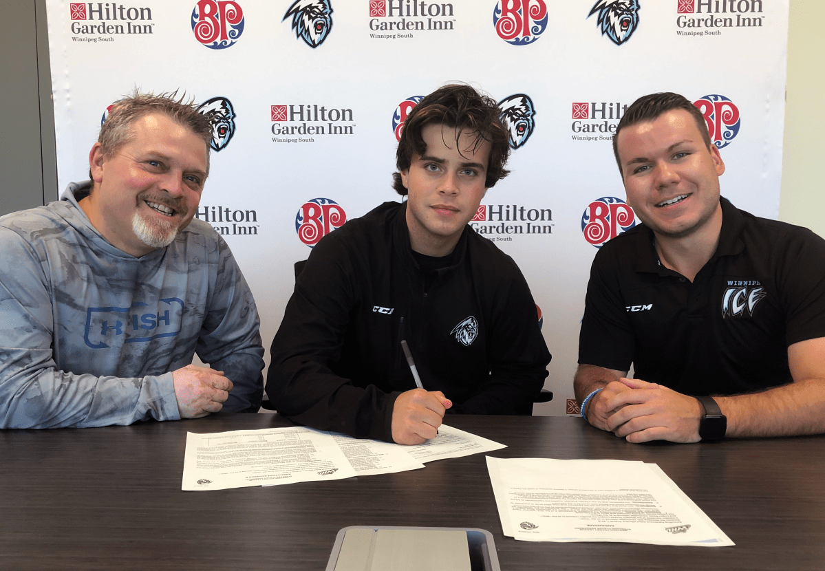 Logan Danis signing standard WHL contract with Ice Director Scouting, Hockey Operations Jake Heisinger. Supplied Photo .
