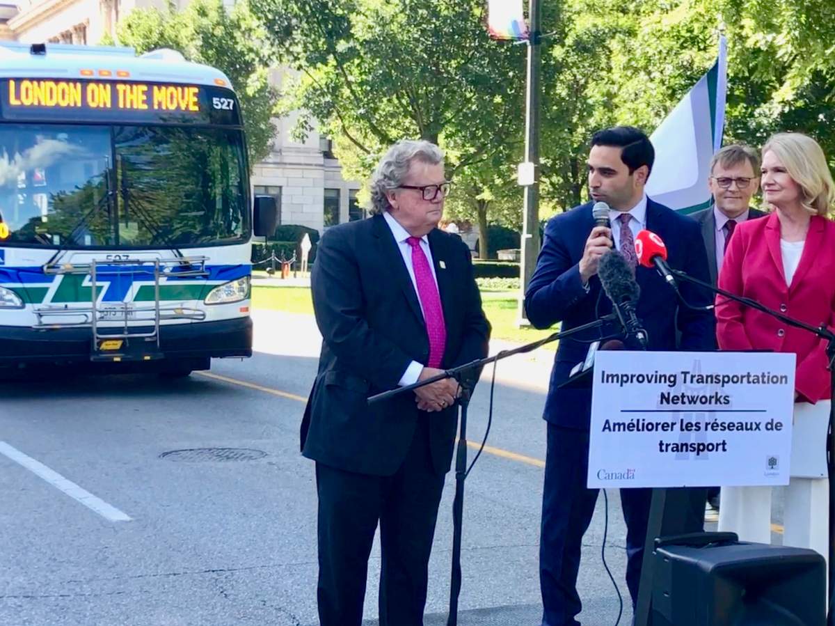 London Mayor Ed Holder, London North Centre MP Peter Fragiskatos, City Manager Martin Hayward, and London West MP Kate Young (left to right) outside of London City Hall.