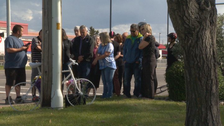 People in Calgary gathered for the Ghost Bike Memorial Ride on Sunday, Aug. 25, 2019.