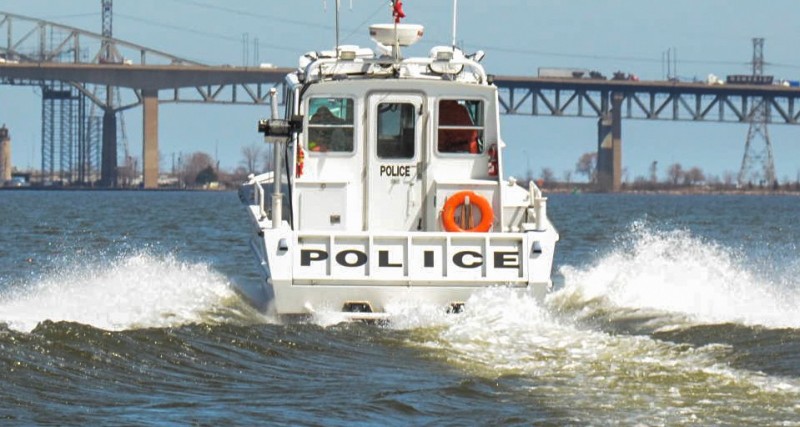 Police say two youths were rescued under the Burlington Canal Street Bridge after their sailboat capsized during a thunderstorm on Tuedsay.