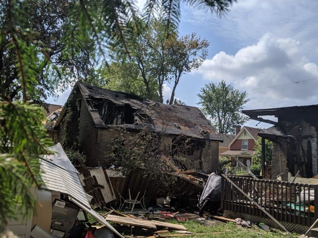 A view of the destruction from a backyard in London's Old East Village on Aug. 16, 2019.