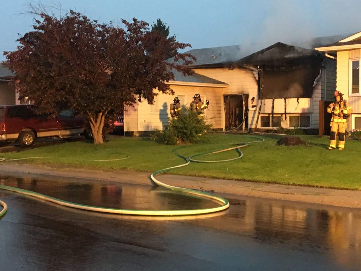 Two homes on 31 Avenue near 48 Street in southeast Edmonton’s Mill Woods area were damaged by fire on Friday, Aug. 30, 2019.