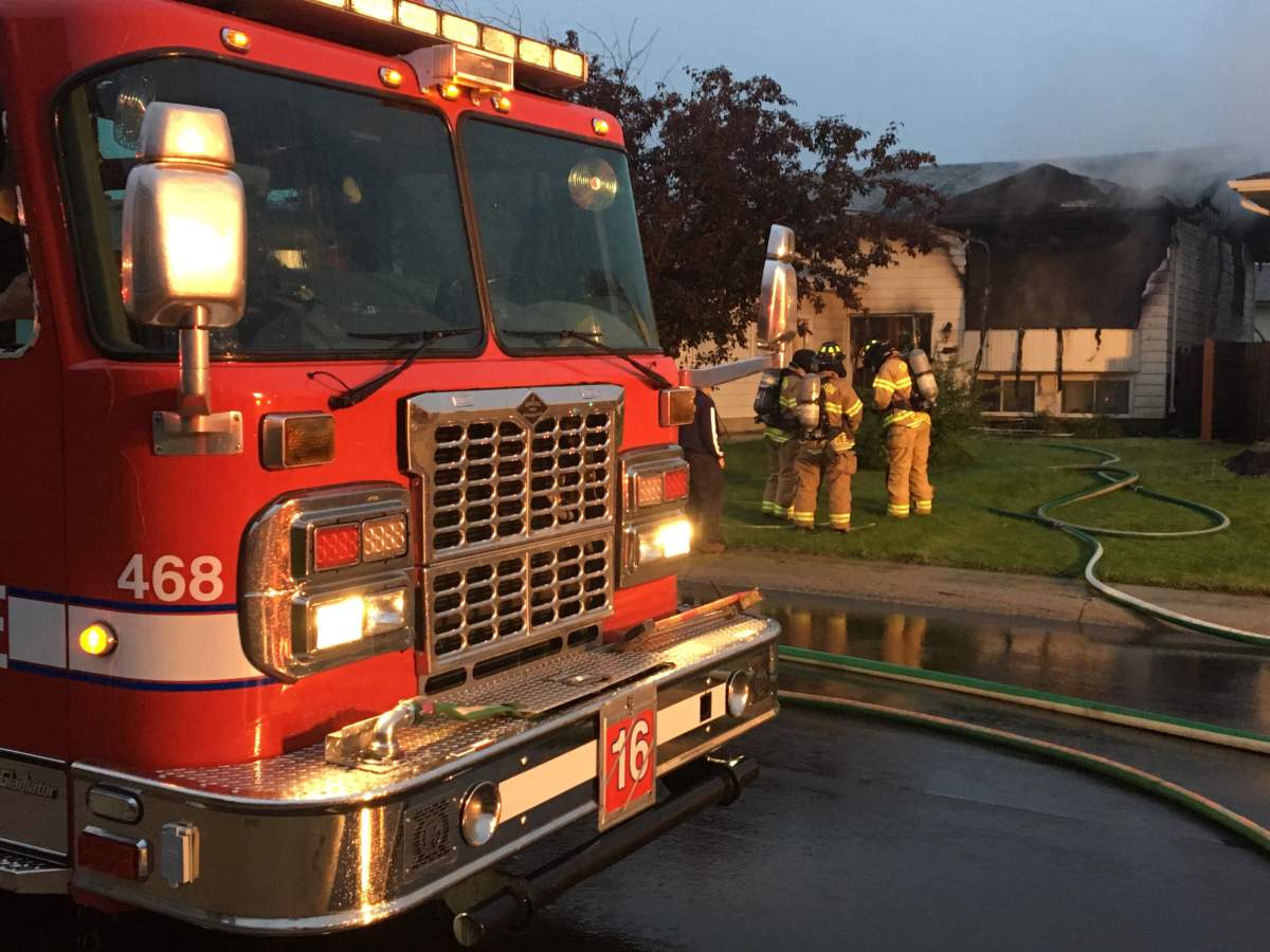 Two homes on 31 Avenue near 48 Street in southeast Edmonton’s Mill Woods area were damaged by fire on Friday, Aug. 30, 2019.