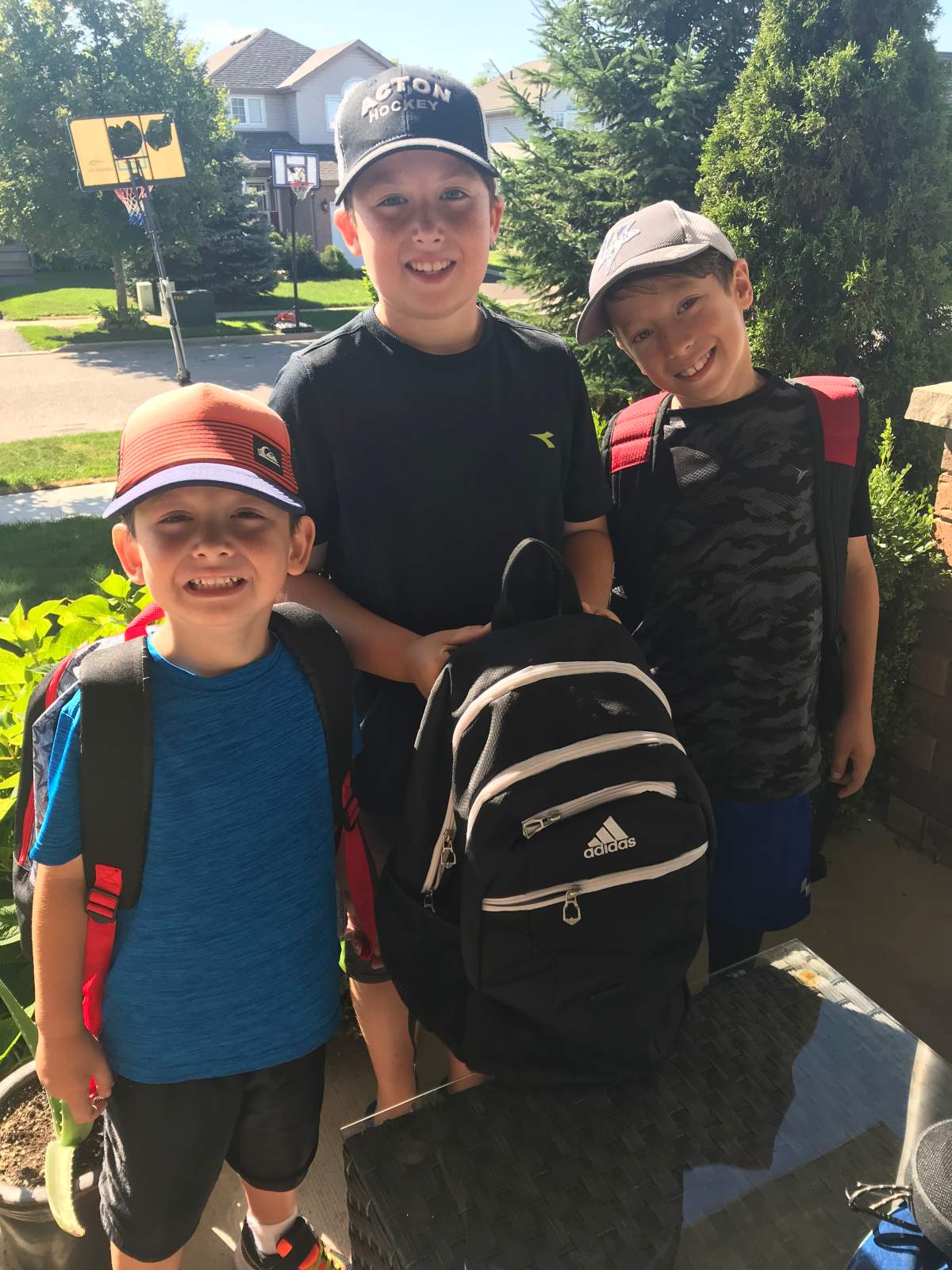Q107 radio host Ryan Parker’s sons are all smiles for back-to-school.
