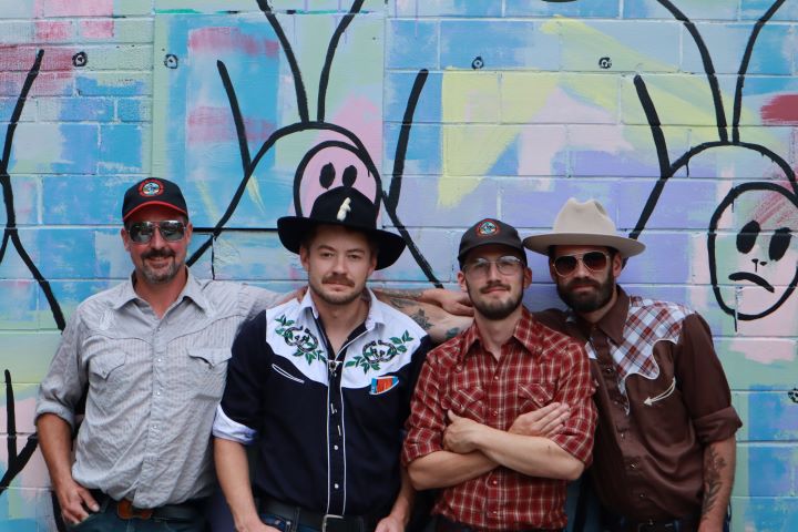 Josh McCallen of The Lucky Ones (left), stands beside band members Ian Smith, Jerome Belanger and Ryan West ahead of the group's Orillia show on Thursday.