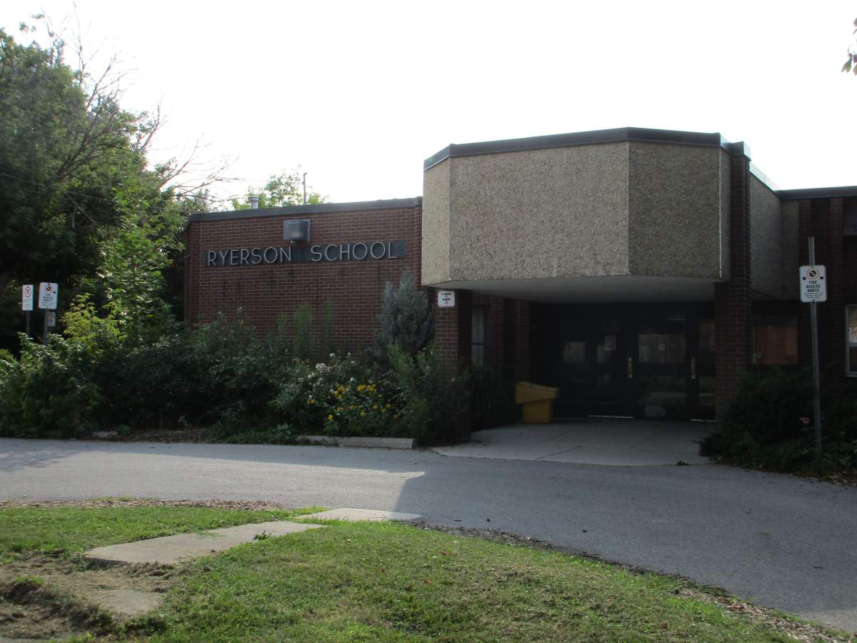 A Hamilton middle school principal is facing charges related to a reported sexual assault from 2017.