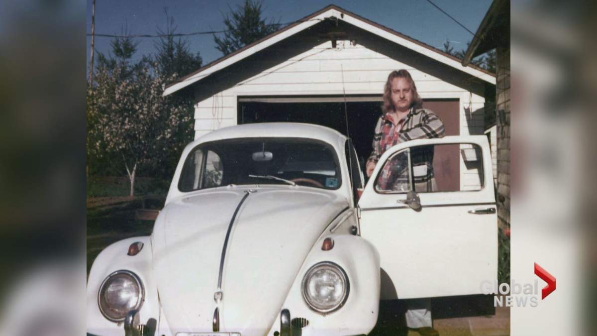 Leonard Dyck poses with his first car in the 1970s.
