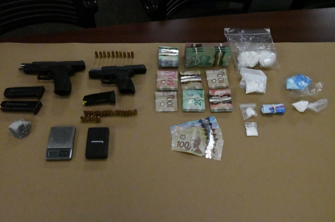 London police say they seized a number of drugs and guns when they completed a search warrant at a residence on Brisbon Street.