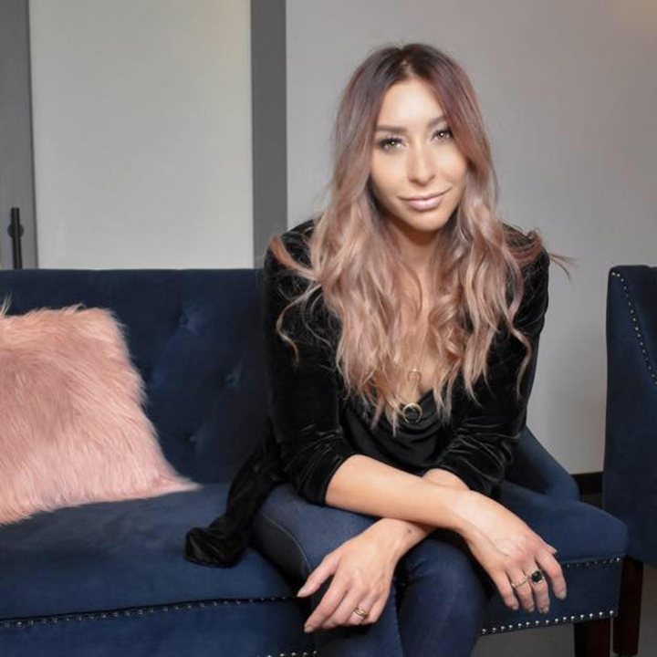 Marissa King, owner of the Maven hair studio in Urbandale, Iowa, is shown in this photo from Oct. 3, 2018.