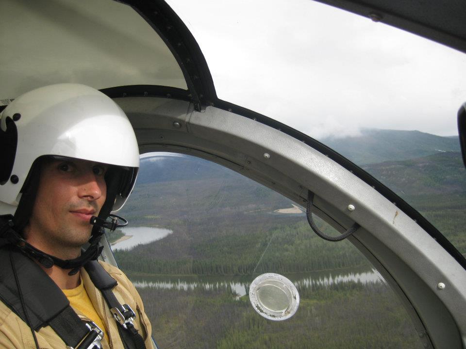 Matthew Linnitt flies a helicopter over Alberta in June 2016.