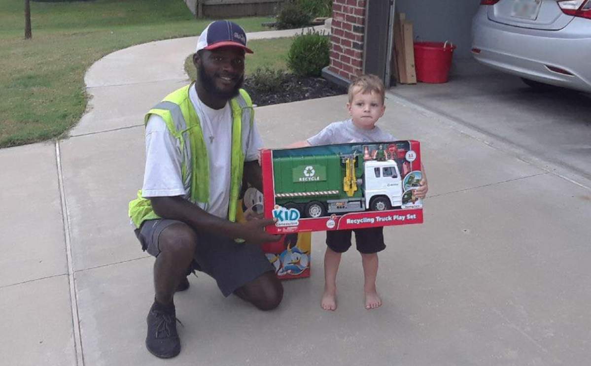 One little boy spent many mornings outside to spot his favourite garbage crew.