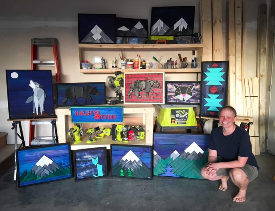 Haley Mulder displaying her artwork while going through chemotherapy.