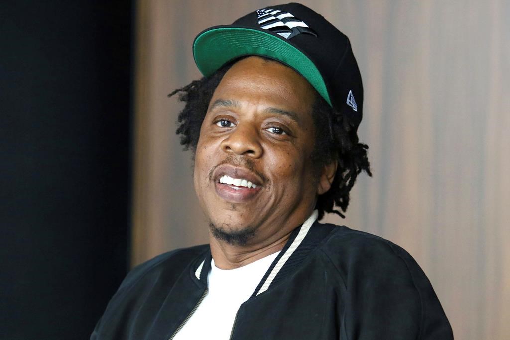Jay-Z makes an announcement of the launch of Dream Chasers record label in joint venture with Roc Nation, at the Roc Nation headquarters in New York. (Photo by Greg Allen/Invision/AP, File).
