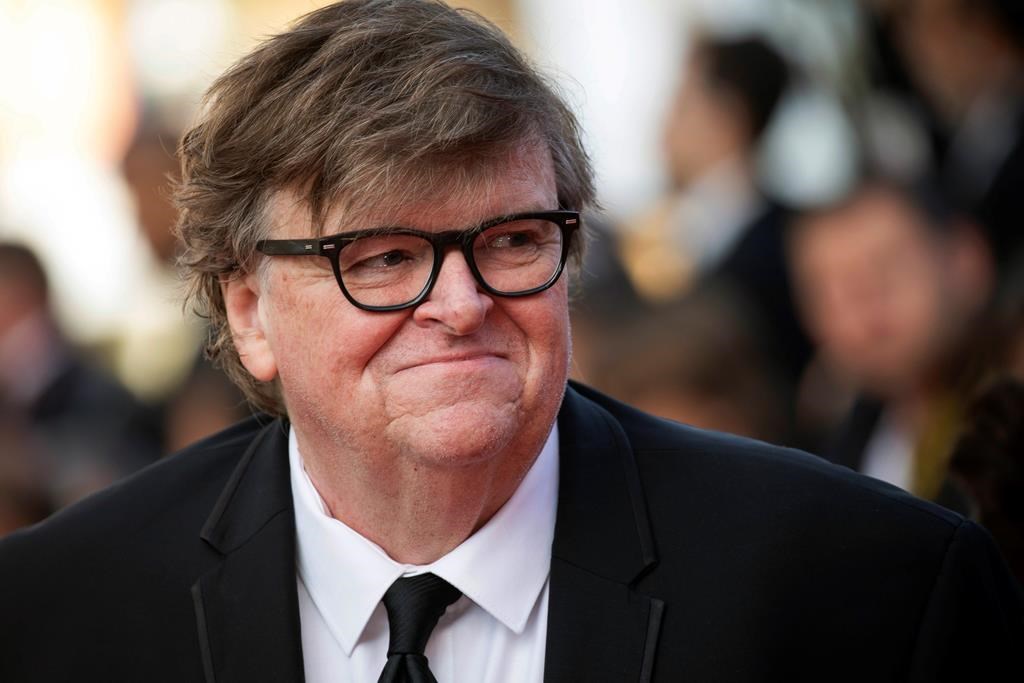 This May 25, 2019, file photo shows Michael Moore at the awards ceremony of the 72nd international Cannes Film Festival in southern France.