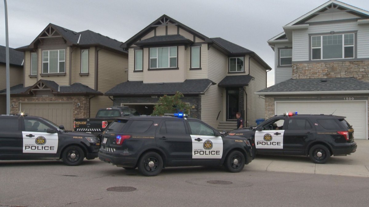 Calgary police on the scene of a break and enter where an officer was bitten by a police dog on Friday, Aug. 16. 