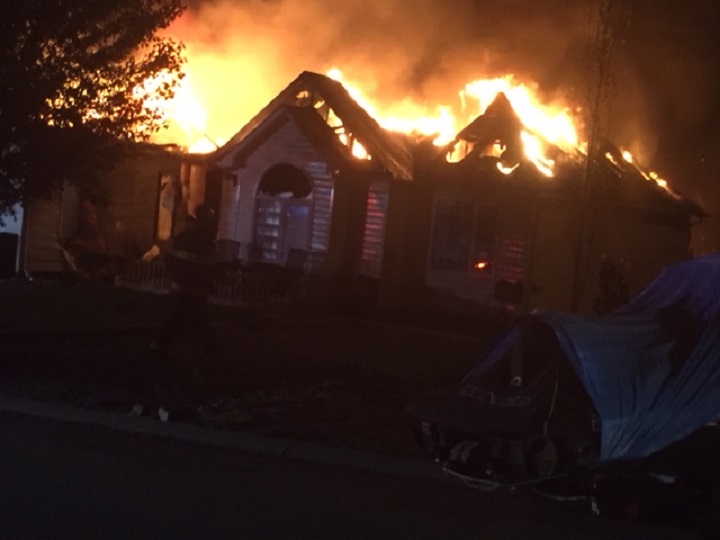 Flames shooting out of a Peachland home early on Saturday morning.