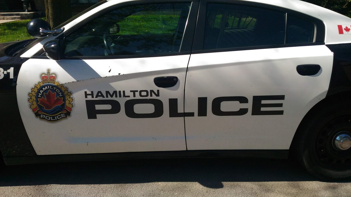 Hamilton police say the suspect was arrested the day after he allegedly pointed a handgun at another motorist during a dispute.