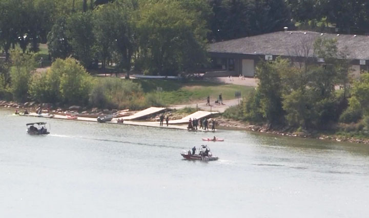 Water rescue boats equipped with sonar technology and divers were deployed to look for a person in the South Saskatchewan River on Wednesday, Aug. 21, 2019.