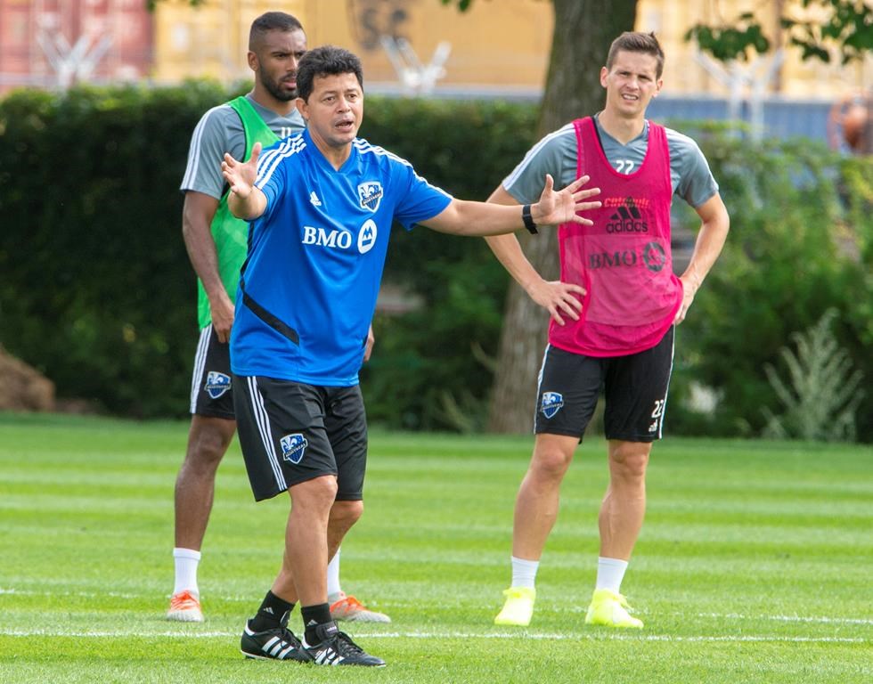 In this August 22, 2019 file photo, the Montreal Impact's newly appointed head coach Wilmer Cabrera conducts his his practice in Montreal.