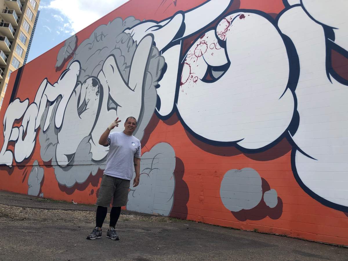 A new Rust Magic International mural on 106 street and 103 avenue is by Los Angeles based street artist Slick.