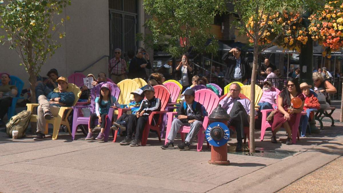 People enjoy live music on Stephen Avenue on Thursday, August 1.
