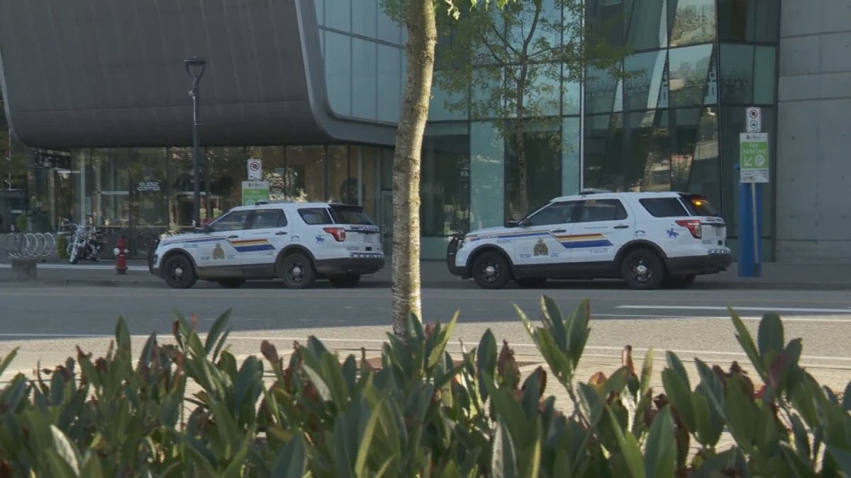 Surrey RCMP vehicles parked outside the Surrey Central Mall on Sunday. 