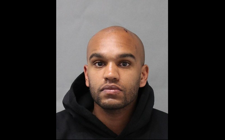 Police arrested Andrew Martin Morris, 26, of Toronto.