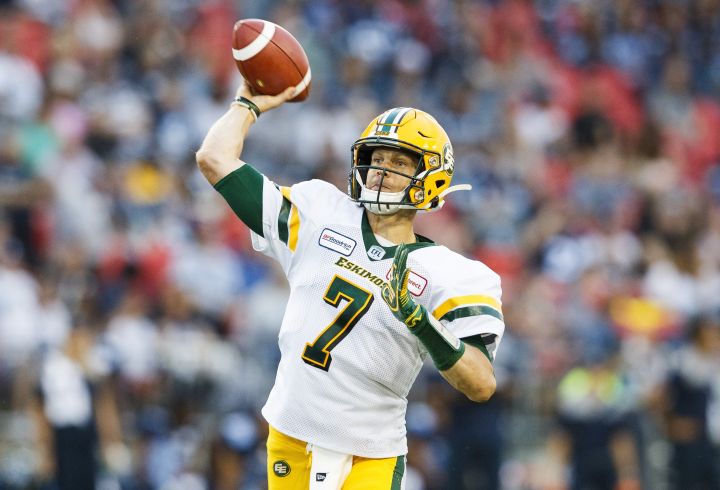 Edmonton Eskimos quarterback Trevor Harris throw the ball against the Toronto Argonauts during the first half of CFL football action in Toronto, Friday August 16, 2019.