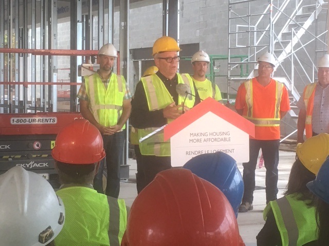 Liberal MP Adam Vaughan announces a federal investment of $1.96 million in an affordable housing project on James Street North.