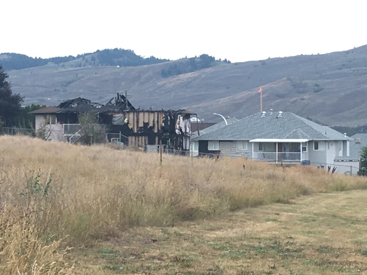 The back of the fire-damaged home.