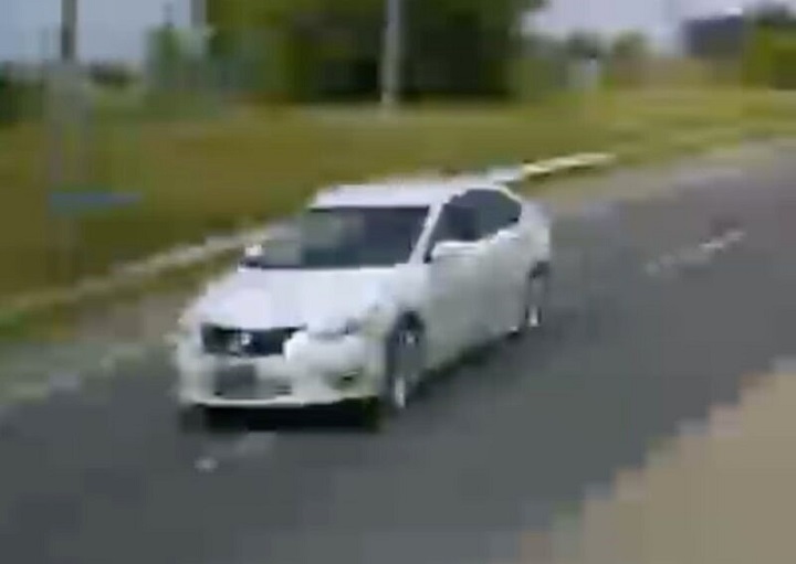 Toronto police release this photo of a white sedan believed to be connected to the fatal pedestrian who was struck Wednesday morning.