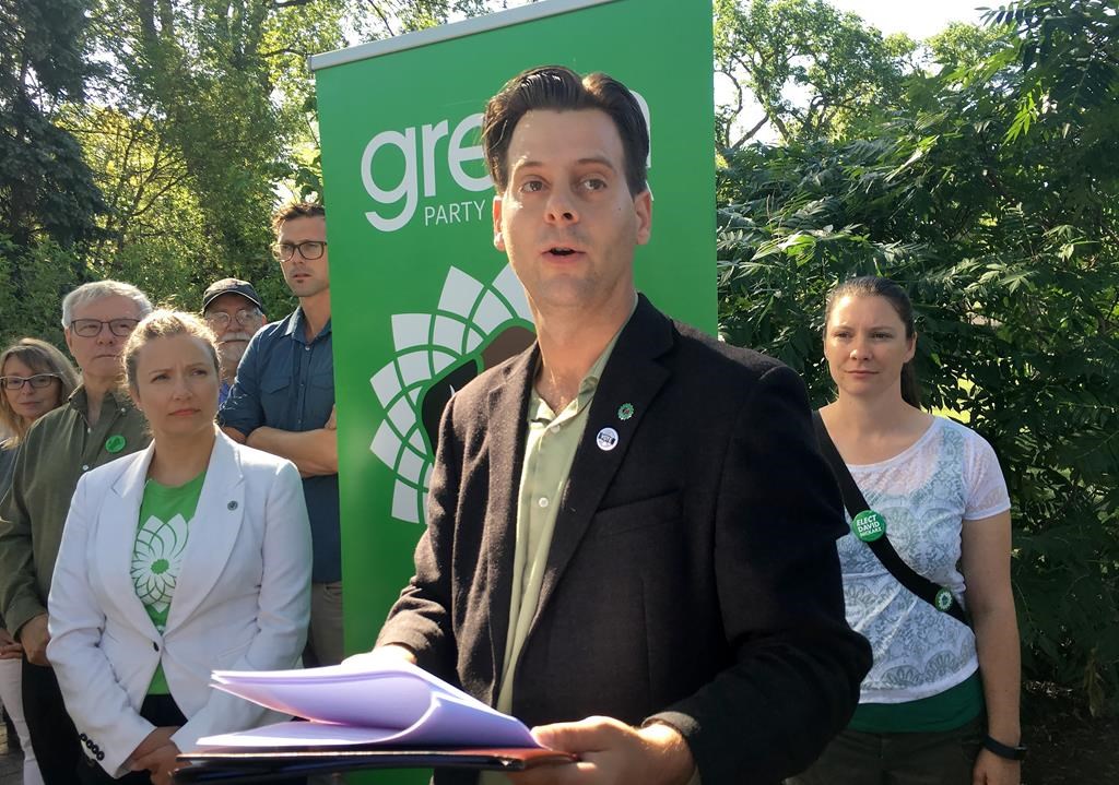 Manitoba Green Party Leader James Beddome talks to reporters as he releases his party's platform for the Sept. 10 Manitoba election, in Winnipeg on Friday, Aug. 9, 2019. THE CANADIAN PRESS/Steve Lambert.