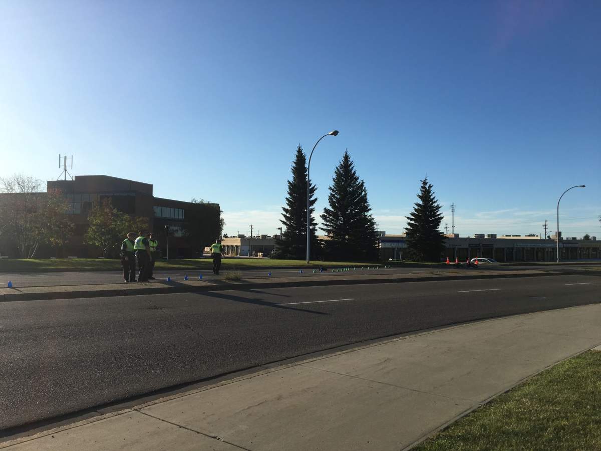 Edmonton police investigate after a motorcycle crashed near 85 Street and 53 Avenue on Sept. 21, 2019.