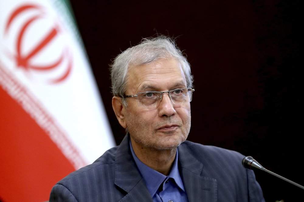 In this July 7, 2019, photo, Iran's government spokesman Ali Rabiei speaks in a press briefing in Tehran, Iran. Iran will "take a strong step" away from its 2015 nuclear deal with world powers if Europe cannot offer the country new terms by a deadline at the end of this week, Rabiei said Monday as top Iranian diplomats traveled to France and Russia for last-minute talks.