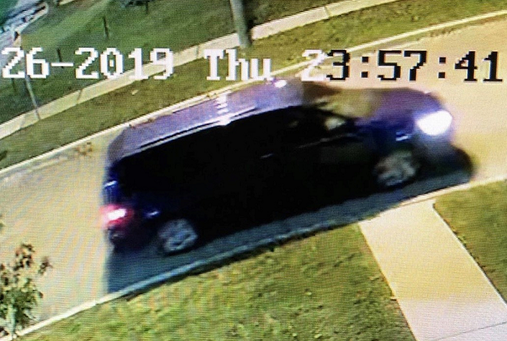 Police say four male suspects were seen leaving the area in a blue Dodge Caravan.
