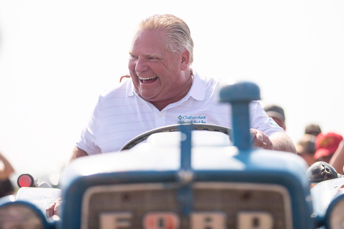 Ontario Premier Doug Ford sits on a Ford tractor as he plows a furrow at the International Plowing Match in Pain Court Ont. Tuesday, September 18, 2018.