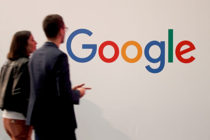 Visitors pass by the logo of Google at the high profile startups and high tech leaders gathering, Viva Tech,in Paris, France, May 16, 2019. 