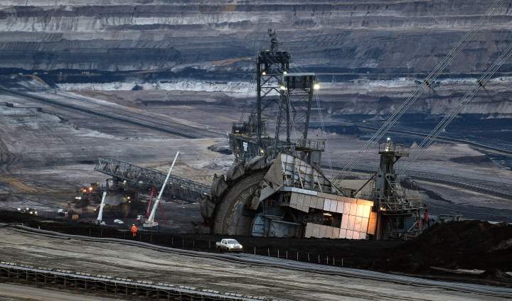 Giant bucket wheels produce brown coal at the open pit mining Garzweiler in Jackerath, Germany, Friday, Dec. 7, 2018. 