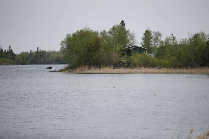 A house sits on the edge of Shoal Lake 40 First Nation on Thursday, May 30, 2019. 
