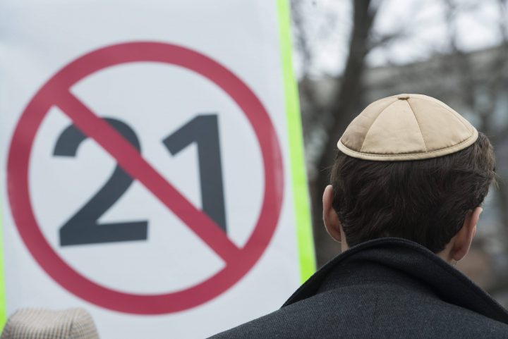 A man wears a kippah during a demonstration opposing the Quebec government's newly tabled Bill 21 in Montreal, Sunday, April 14, 2019.