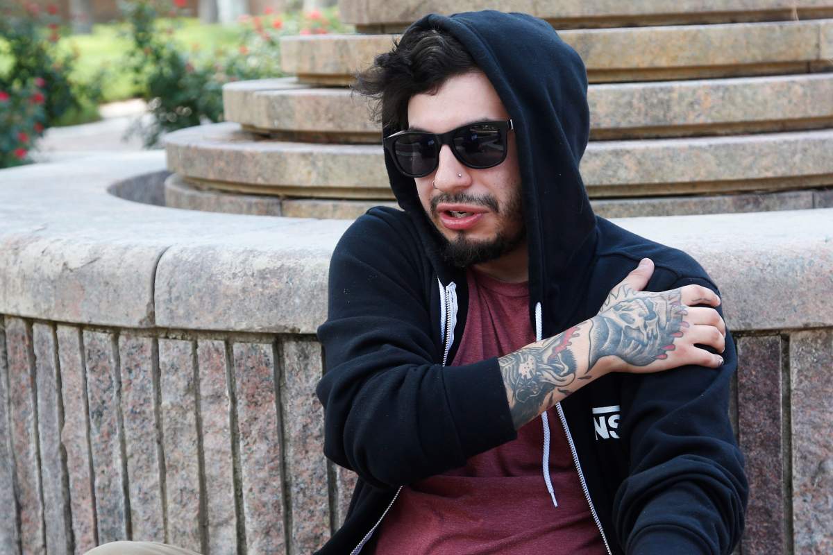 Daniel Munoz talks about his experience being injured in Saturday’s shooting incident during an interview in a park in Odessa, Texas, Sunday, Sept. 1, 2019.