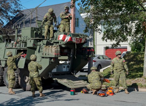 Members of the 4 Engineer Support Regiment from Camp Gagetown assist in the cleanup in Halifax on Monday, Sept. 9, 2019.