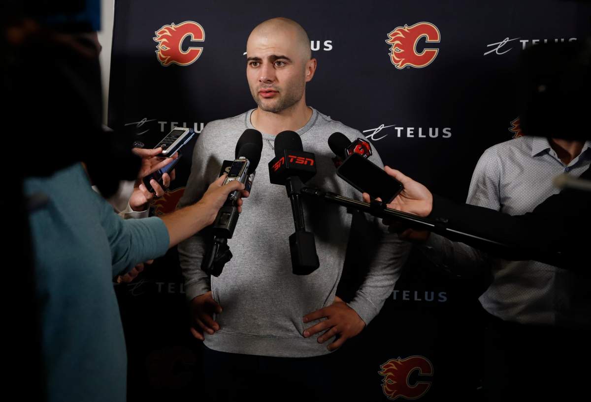 Calgary Flames’ Mark Giordano speaks to the media at the Flames main camp testing day in Calgary, Thursday, Sept. 12, 2019.