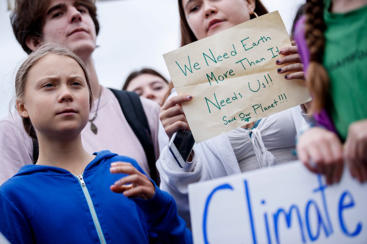 Greta Thunberg (L), the 16 year old climate change activist from Sweden, participates in a School Strike for Climate reform on the Ellipse near the White House in Washington, DC, USA, 13 September 2019.