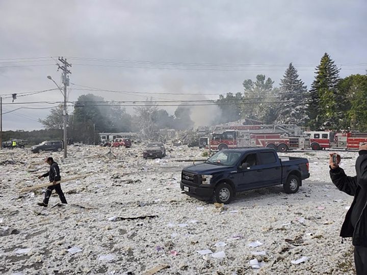 A man works at the scene of a deadly propane explosion, Monday, Sept. 16, 2019, which leveled new construction in Farmington, Maine. 