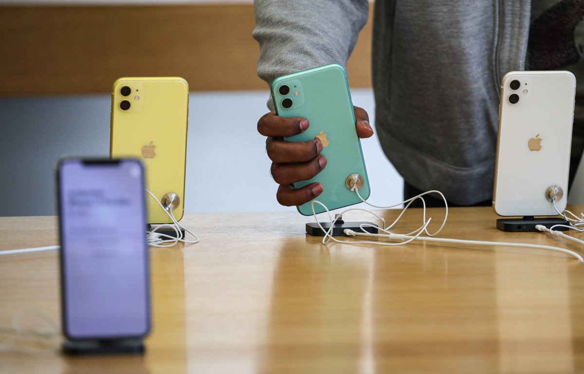 A customer checks the new iPhone 11 on display at the Apple Store in Frankfurt Main, Germany, 20 September 2019.