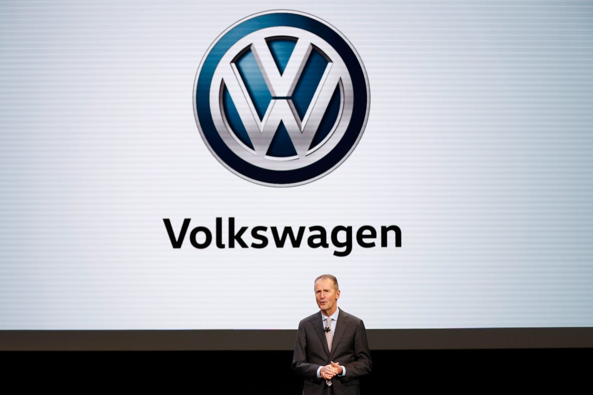 In this Monday, Jan. 14, 2019, file photo, Herbert Diess, CEO, Volkswagen AG, speaks during media previews for the North American International Auto Show in Detroit.  