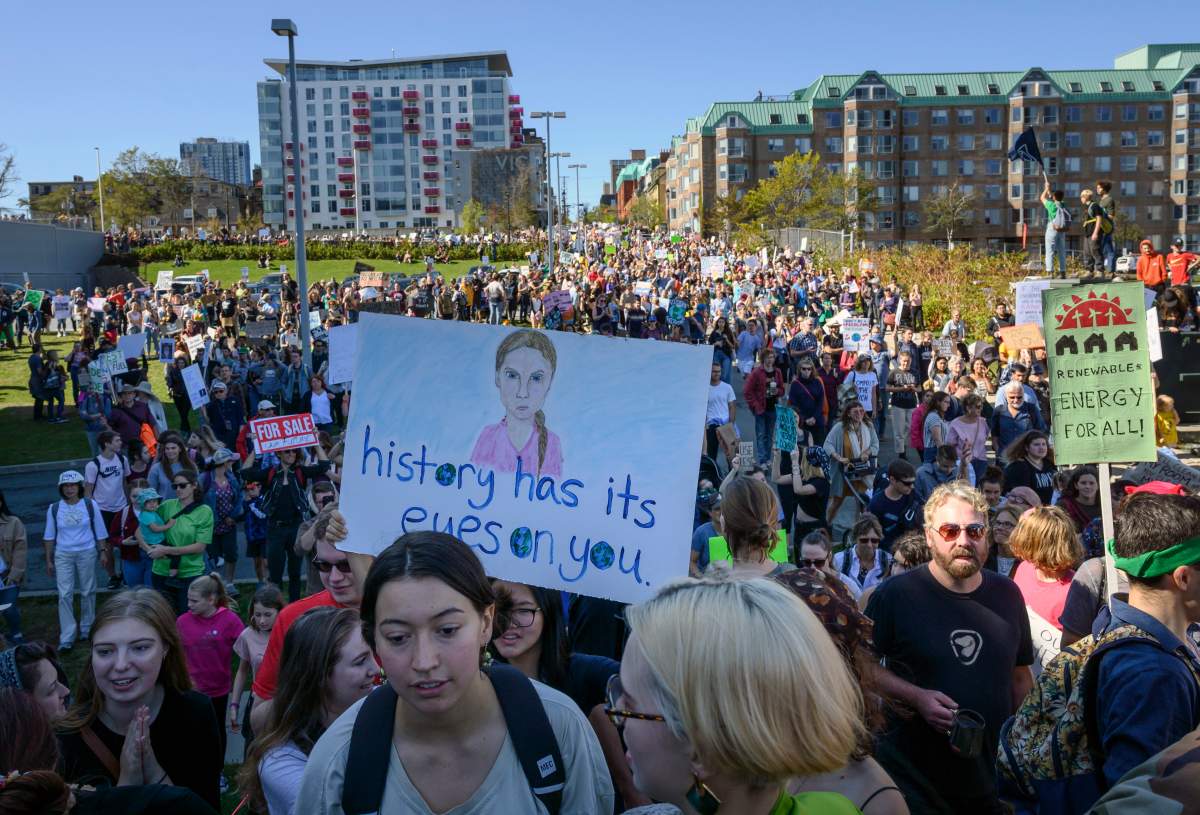 Thousands march on the property of Nova Scotia Power during the climate strike in Halifax on Friday, Sept. 27, 2019. (THE CANADIAN PRESS/Darren Calabrese)